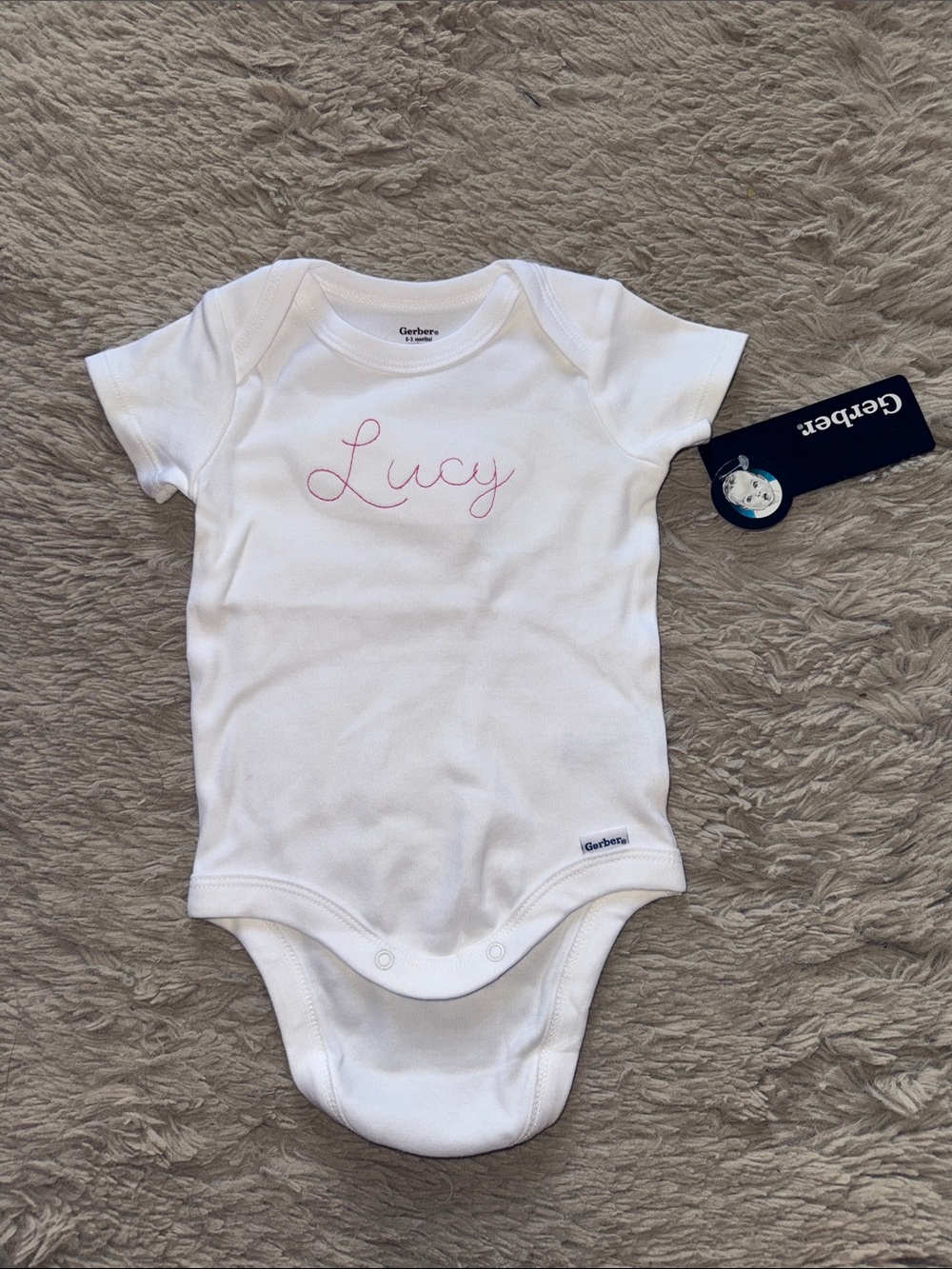 Gerber White Baby One-Piece with Pink 'Lucy' Embroidery